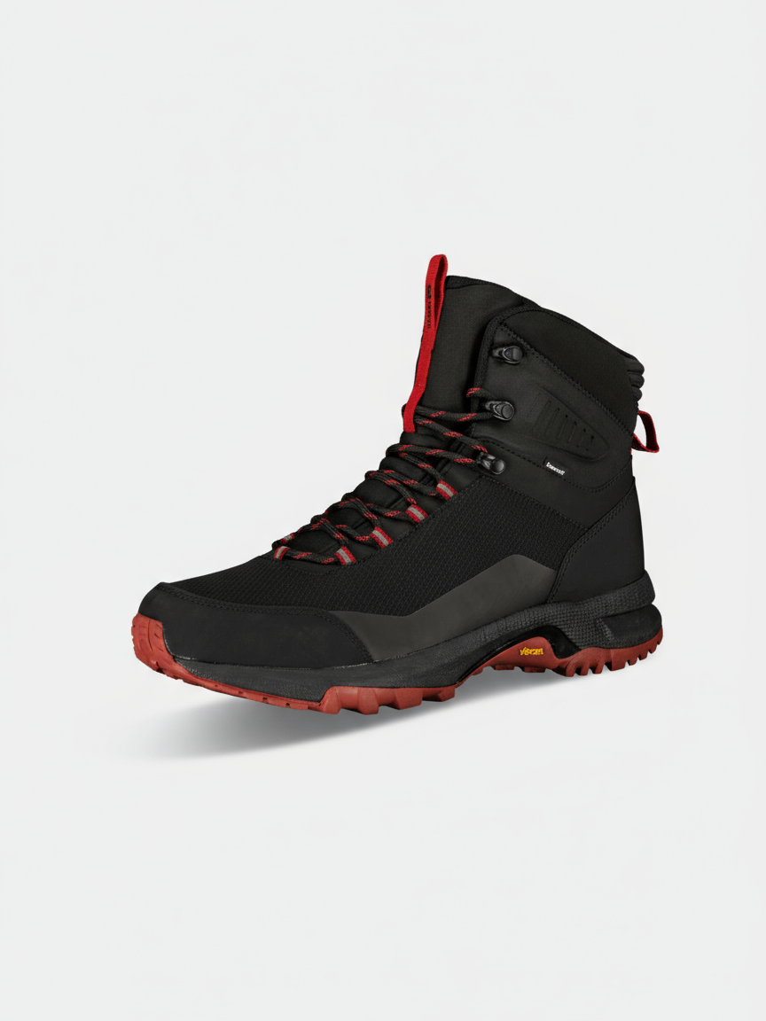 Halti Rorvik Mid DX vaelluskenkä, musta/punainen vedenpitävä DrymaxX & Vibram pohja, valkoisella pohjalla.