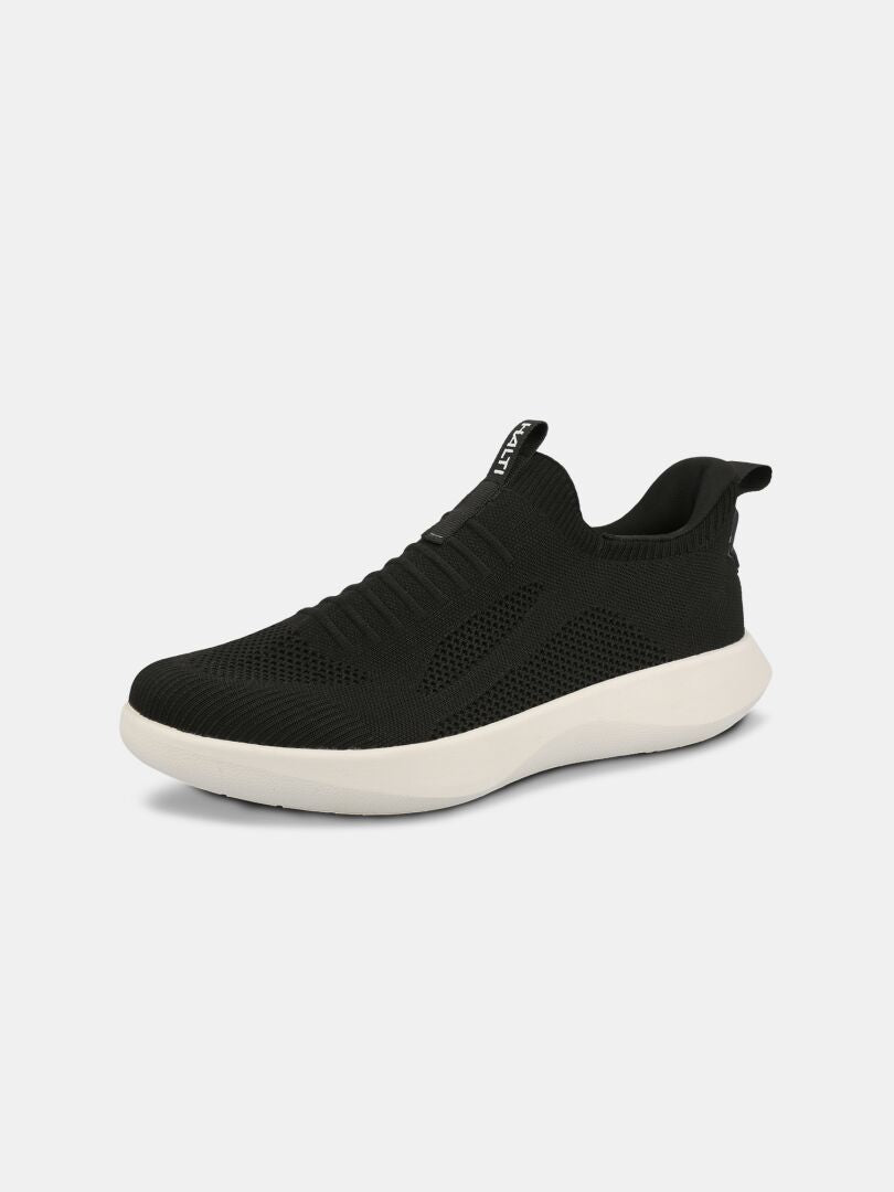 Halti Snabb 2 StepIn Kenkä Naisten: musta mesh slip-on, valkoinen pohja, Halti StepIN kantarakenne, kevyt vapaa-ajan kenkä.