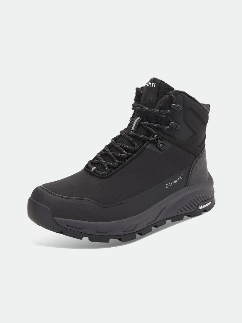 Black Halti Tunturi Mid DX IC -talvikenkä, jossa on urapohja, tekoturkisvuori ja Michelin Ice Grip -tekniikka.