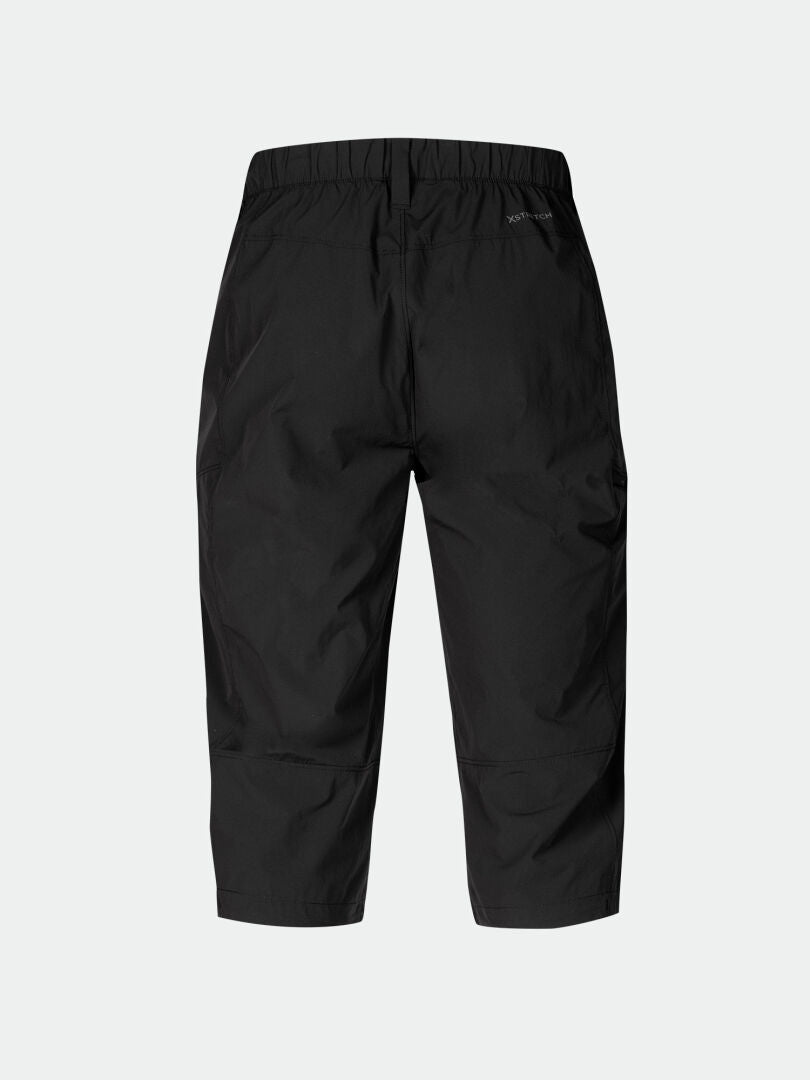 Halti Pallas Cool X-stretch Miesten Caprit selästä päin, jossa joustava vyötärönauha, minimalistinen muotoilu ja nopeasti kuivuva.