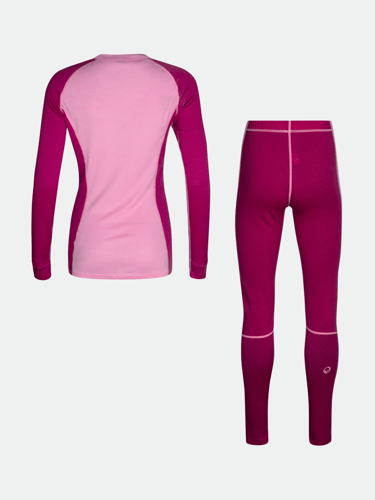 Halti Hossa Merinovillakerrasto Naisten vaaleanpunainen/magenta lämpöpaita ja leggingsit kuvassa valkoisella pohjalla.