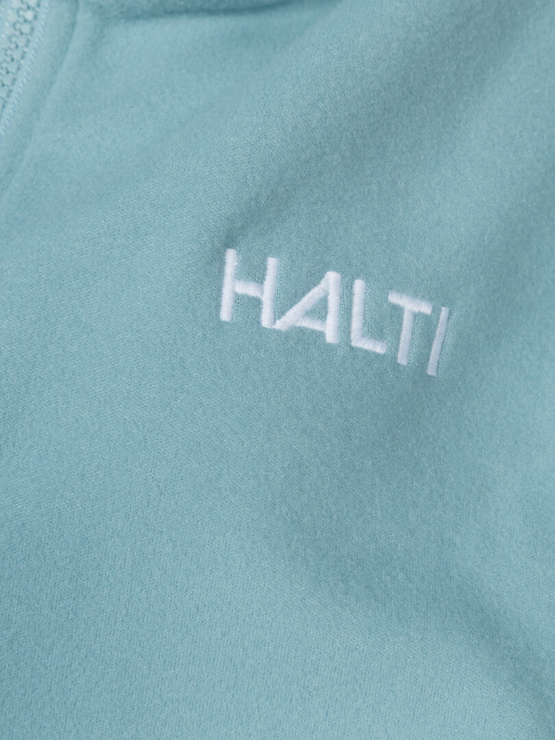 Lähikuva Rockmoon Fleecetakki Naisten by Halti, tekninen fleece valkoisella kirjailulla, ihanteellinen ulkoilu.