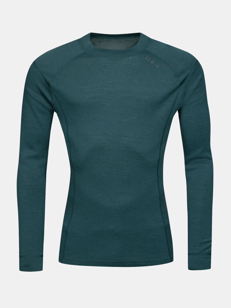 Halti Hossa II Merino Kerrasto -miesten teal-värinen pyöreäkauluksinen aluspaita, pitkähihainen, kuvassa valkoisella taustalla.