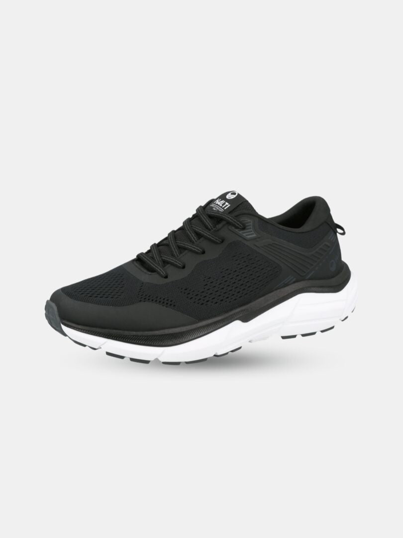 Halti Tempo 3 Lenkkari Miesten: kevyt musta sneaker, hengittävä päällinen ja paksu valkoinen pohja.