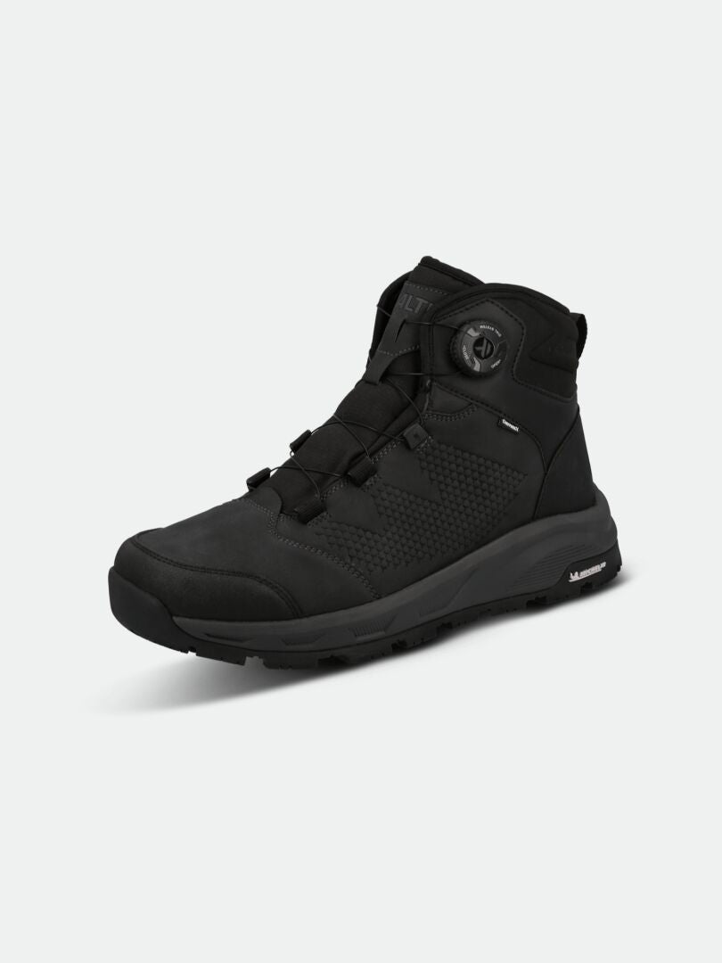 Halti Buli Mid 2 DX Freelock Kitkakenkä, musta mid-top vaelluskenkä, jossa on karkea Michelin-pohja, yksivärisellä pohjalla.
