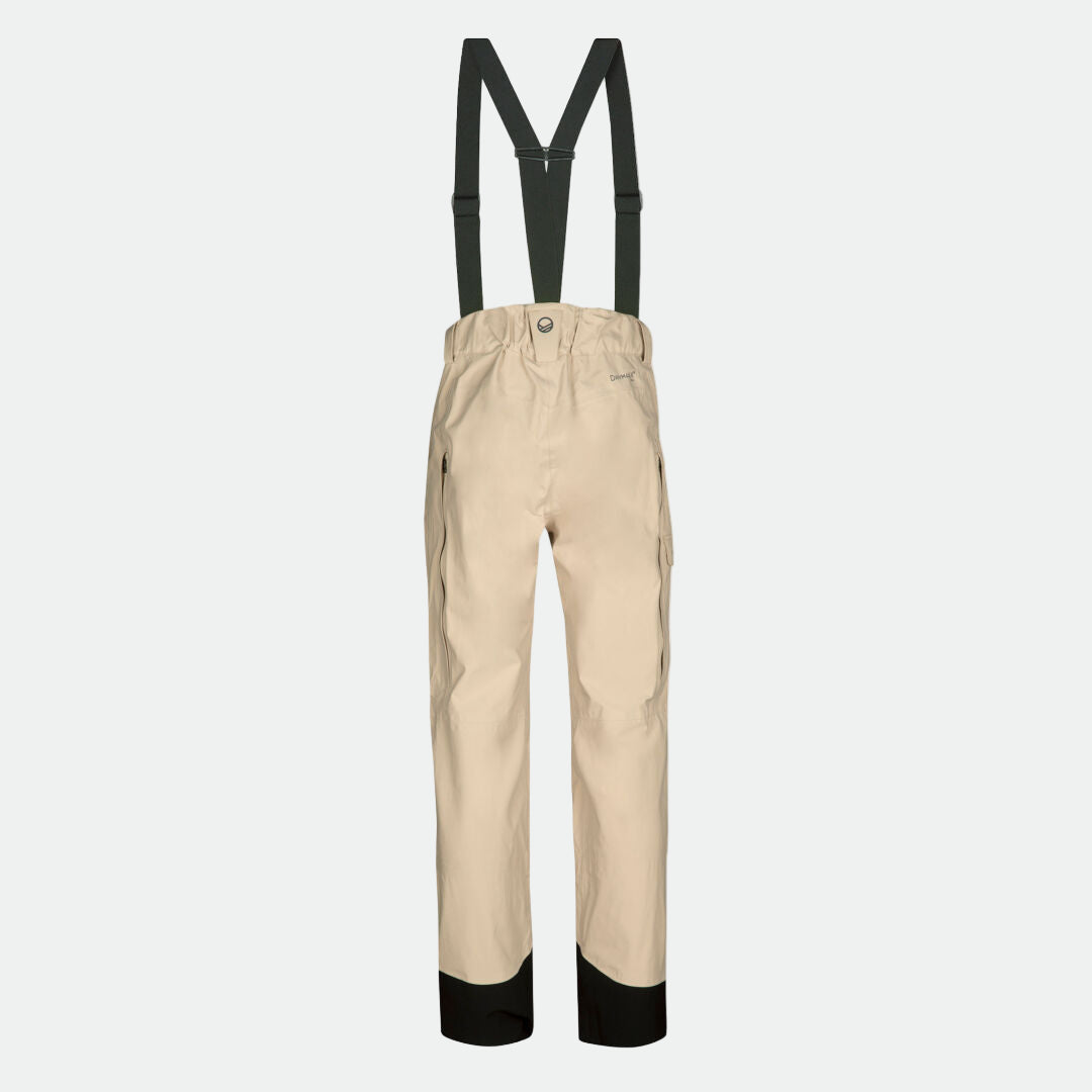 Halti Settler 3L DX Lasketteluhousut Miesten beige, mustat henkselit ja vahvistetut hihansuut, valkoisella pohjalla.