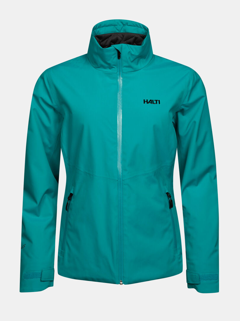 Teal Halti Varion 2in1 DX -laskettelutakki naisille: korkeakauluksinen laskettelutakki, jossa on täyspitkä vetoketju ja vetoketjulliset sivutaskut.