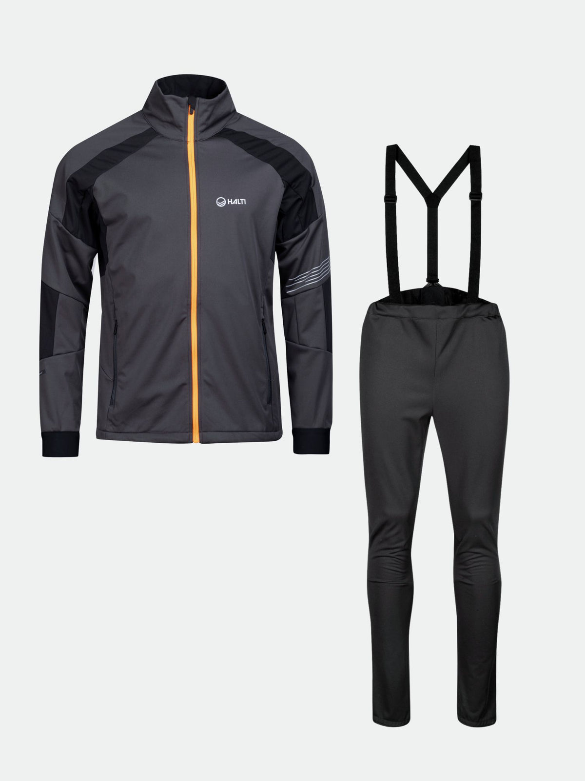 Halti Hyyde Maastohiihtopuku Miesten setissä on musta/harmaa softshell-takki oranssilla vetoketjulla ja yhteensopivat housut.