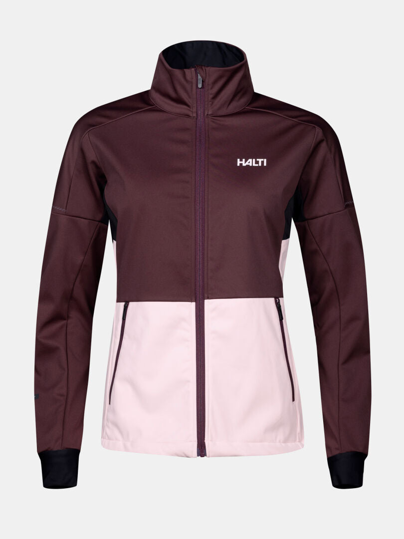 Halti Huuru Maastohiihtopuku Naisten: ruskeanpunainen softshell-takki, jossa on vetoketju edessä, ihanteellinen talviharjoittelu.