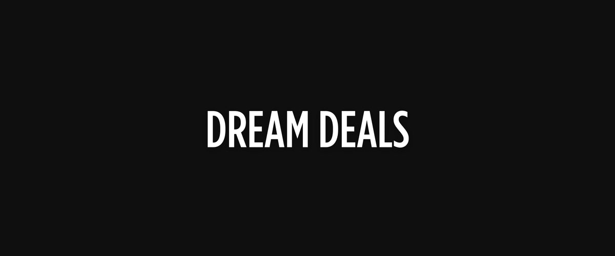 Valkoinen teksti, jossa lukee DREAM DEALS mustalla taustalla.