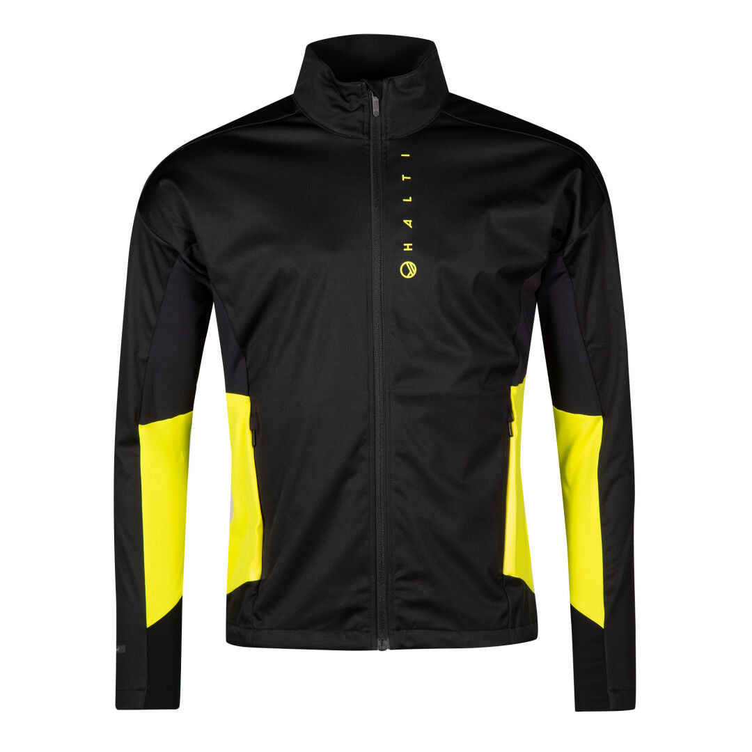 Halti Veloce Hiihtotakki Miesten: musta keltaisilla paneeleilla, Stormwall® stretch, vetoketju edessä ja pystysuora rintateksti.